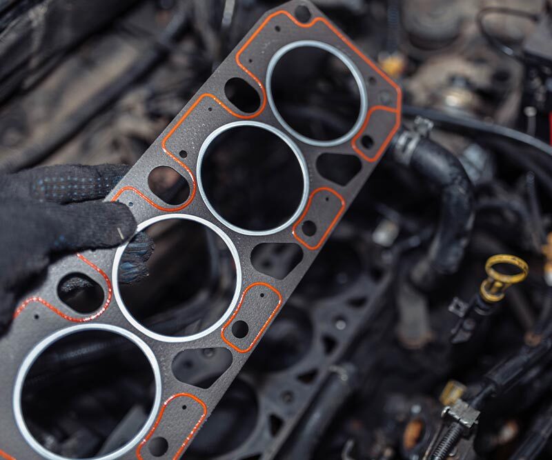 installing a new cylinder head gasket in the engine